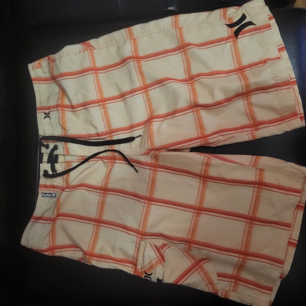 Men's Peach and Orange 32 Waist board shorts. Like new. Only worn twice.